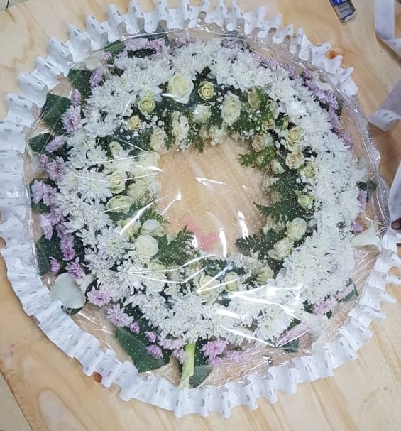 Elegant Sympathy Wreath - White and lavender chrysanthemums with green roses, perfect for remembrance